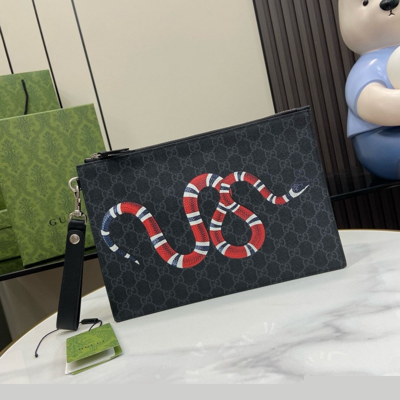 G*u*i clutch bags
